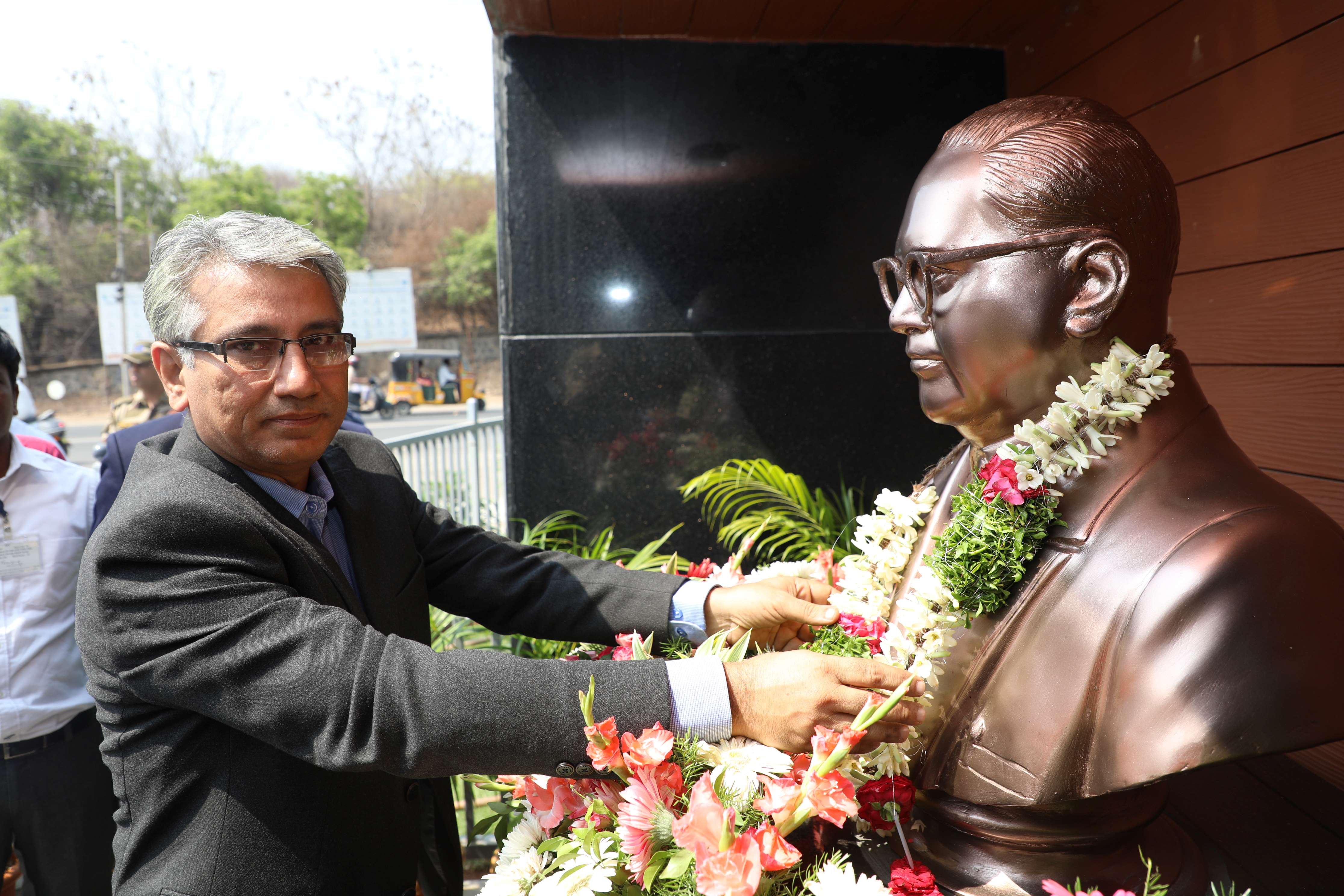  Dr. Komal Kapoor, Chairman & Chief Executive, NFC Paying Tributes to Dr. B.R. Ambedkar by garlanding statue at NFC Main Gate.
