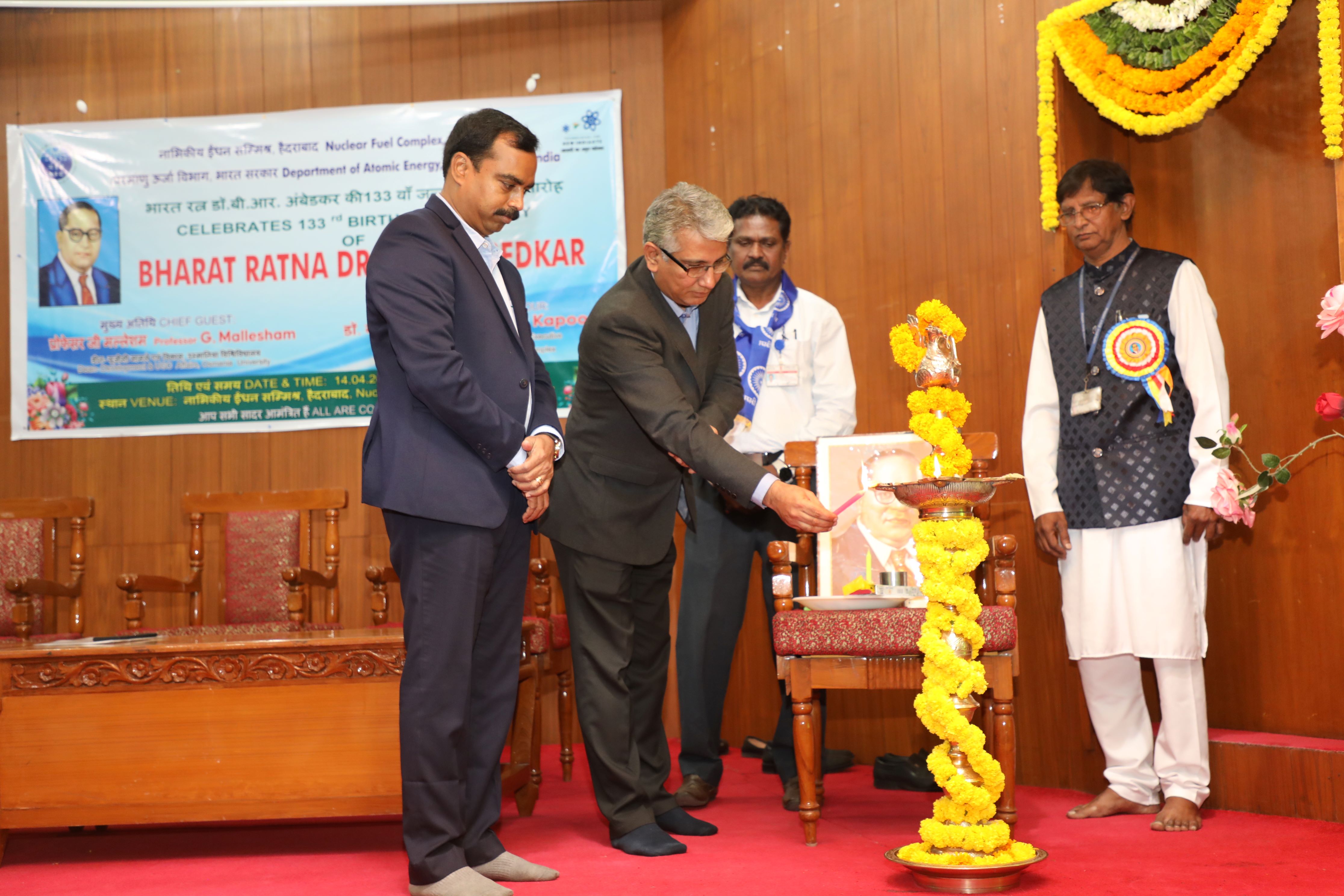 Lighting of lamp by the Dignitaries. 