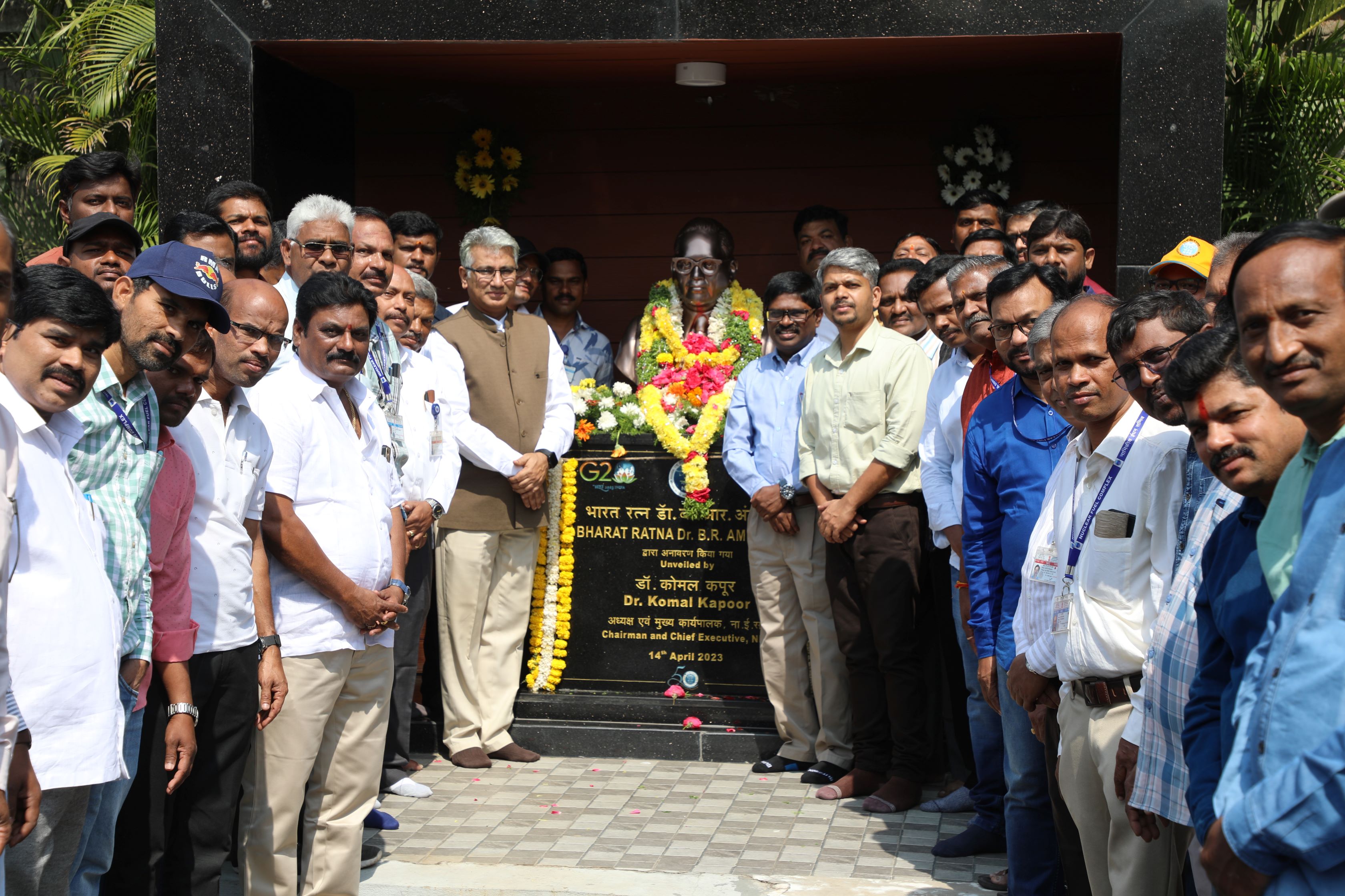 Chief Guest, Guest of Honour and employees of NFC Paying Tributes to Dr. B.R. Ambedkar statue.