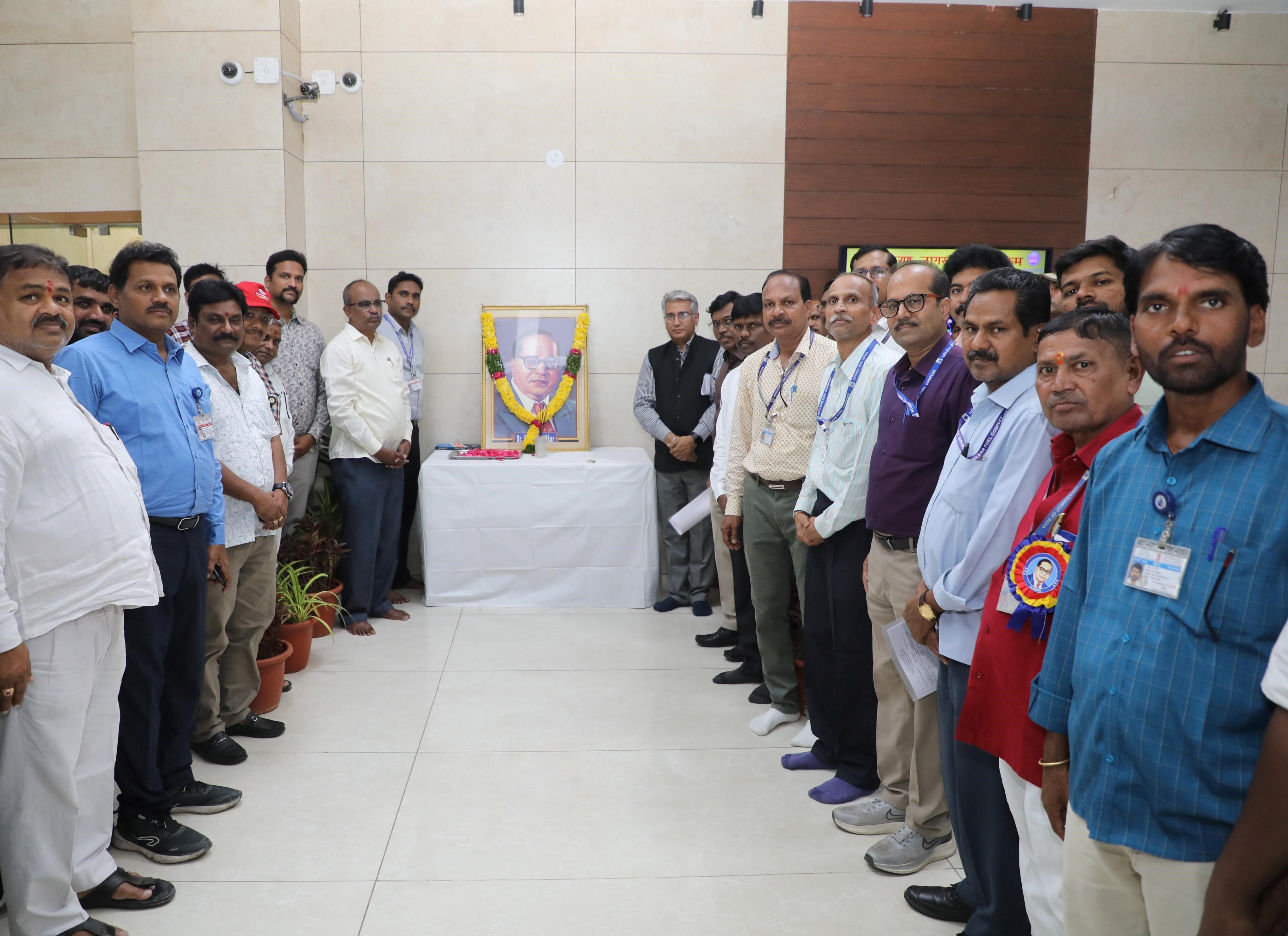 Chief Guest, Guest of Honour, Dy. Chief Executives and others paying tributes to Dr. B.R. Ambedkar portrait.