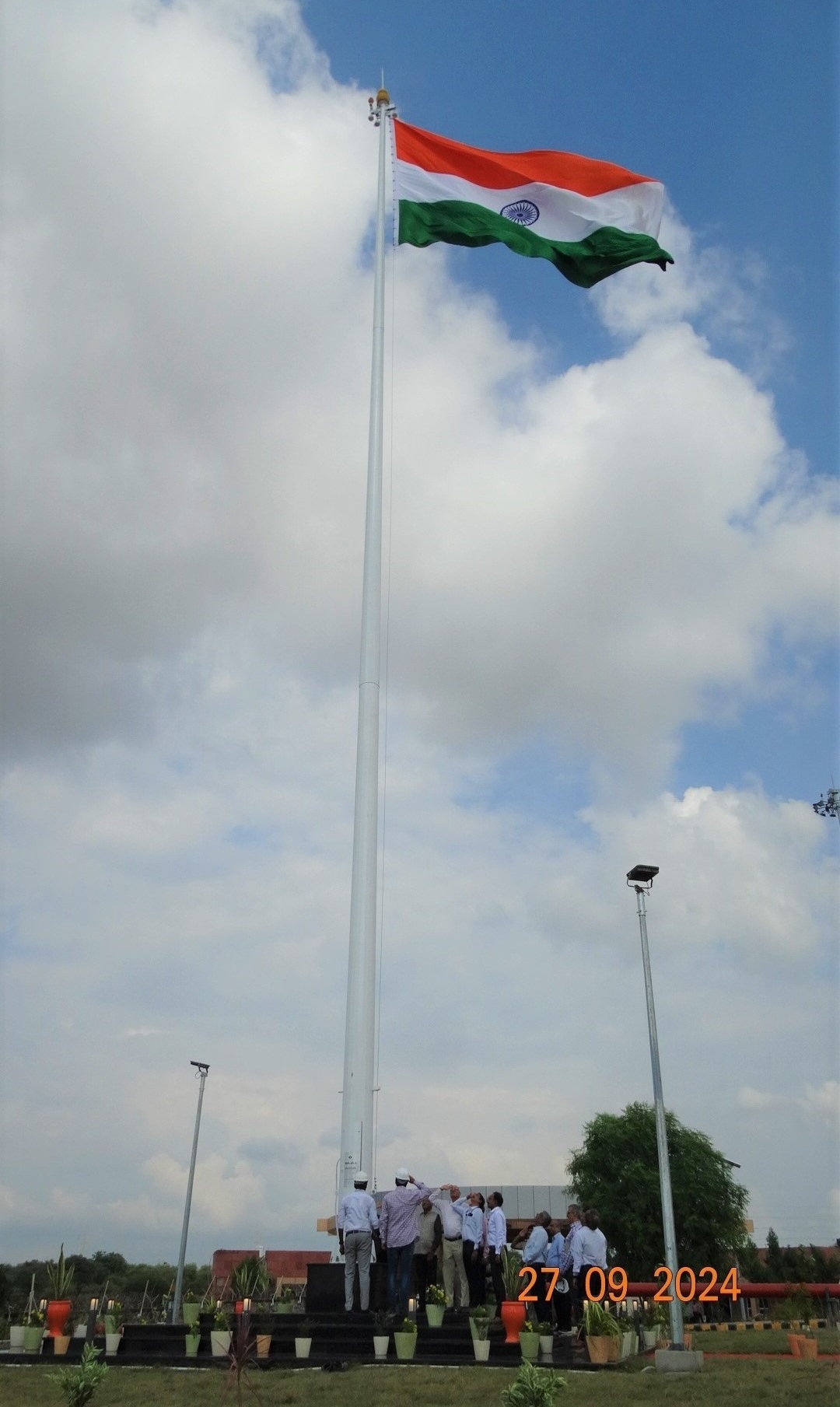 Unveiling of 100-ft-tall national flagpole.