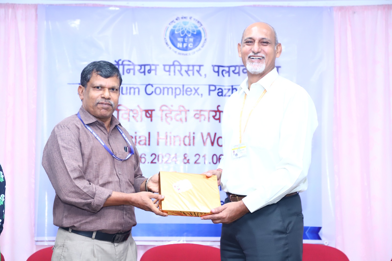 Felicitation of Shri Achaleshwar Singh, Director (Official Language), Department of Atomic Energy by  Manika Shenoy, Deputy General Manager, Zirconium Complex, Pazhayakayal. 