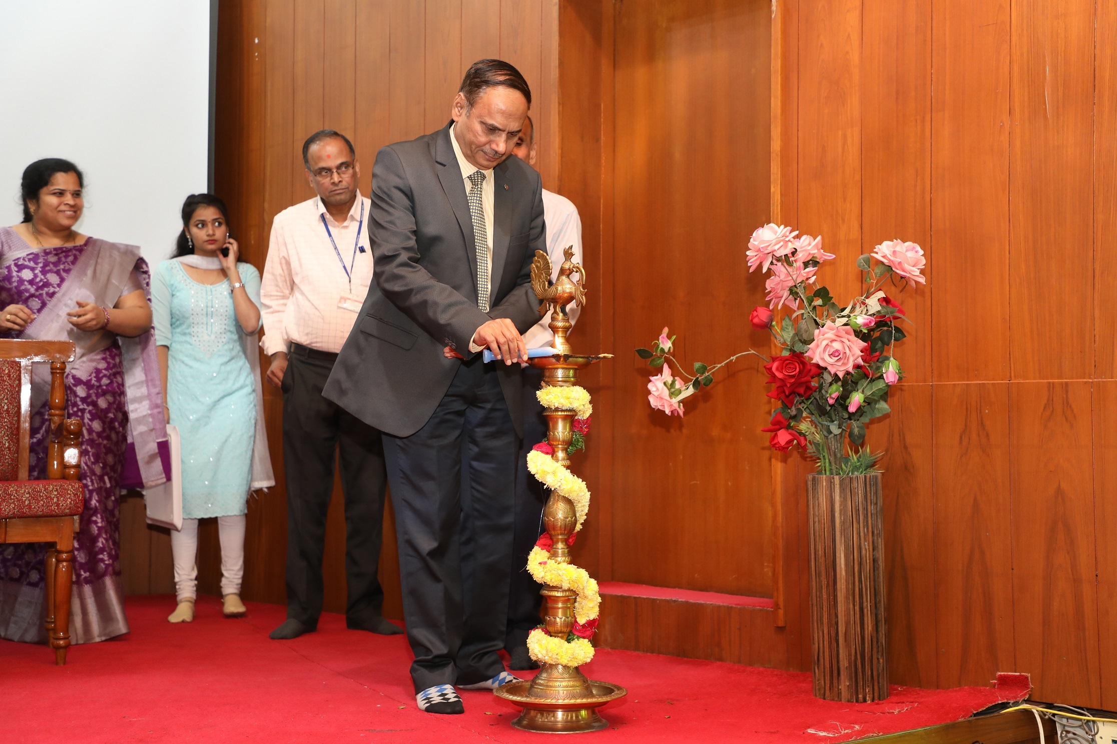 Lighting of Lamp by Guest of honour. 