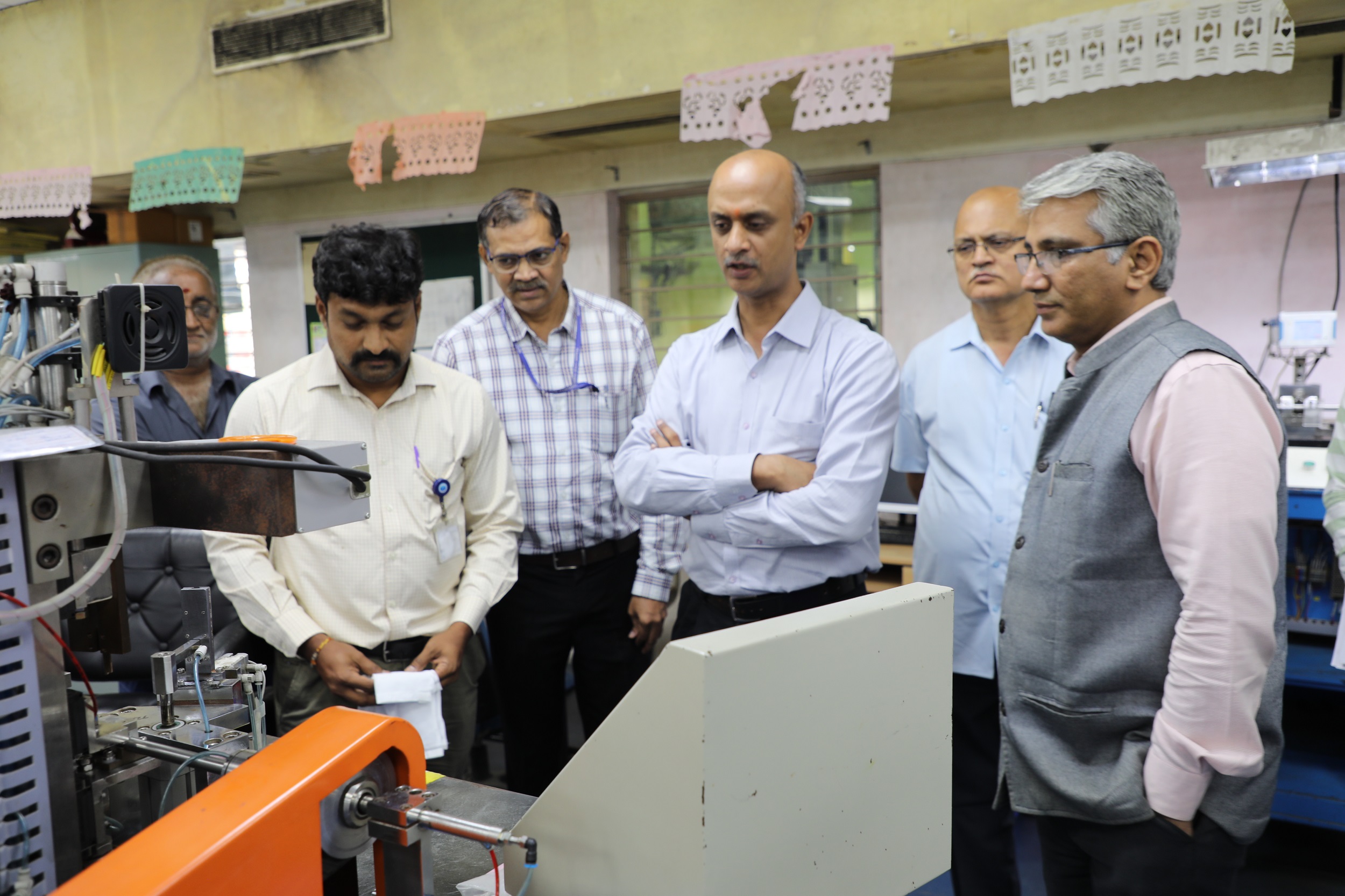 Shri Muthukrishnan Shankaranarayanan, JS (F), DAE at Tube preparation facilities along with Dr. Komal Kapoor, Chairman & CE, NFC. 