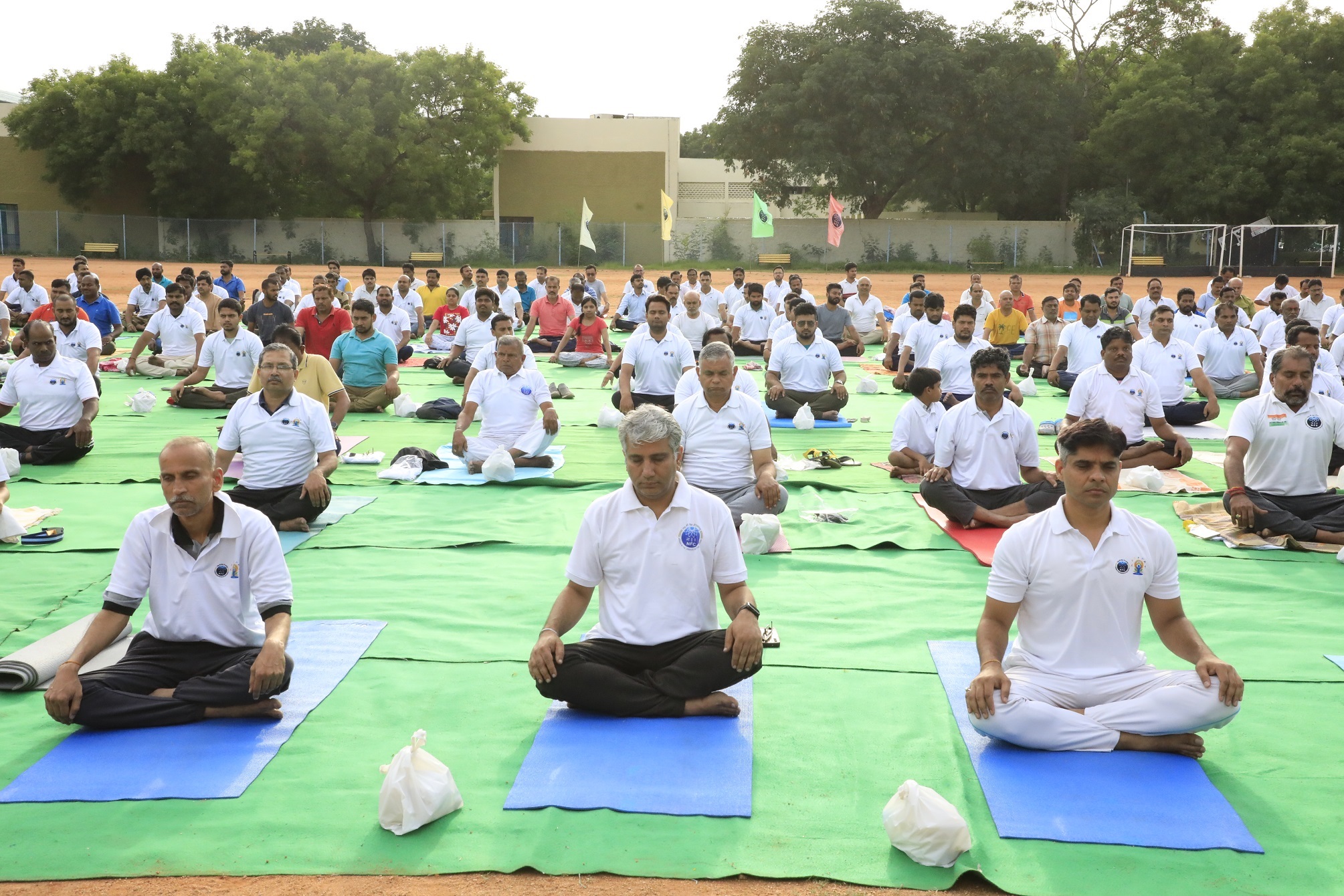 Performing yoga practice by gathering at NFC-Hyderabad. 